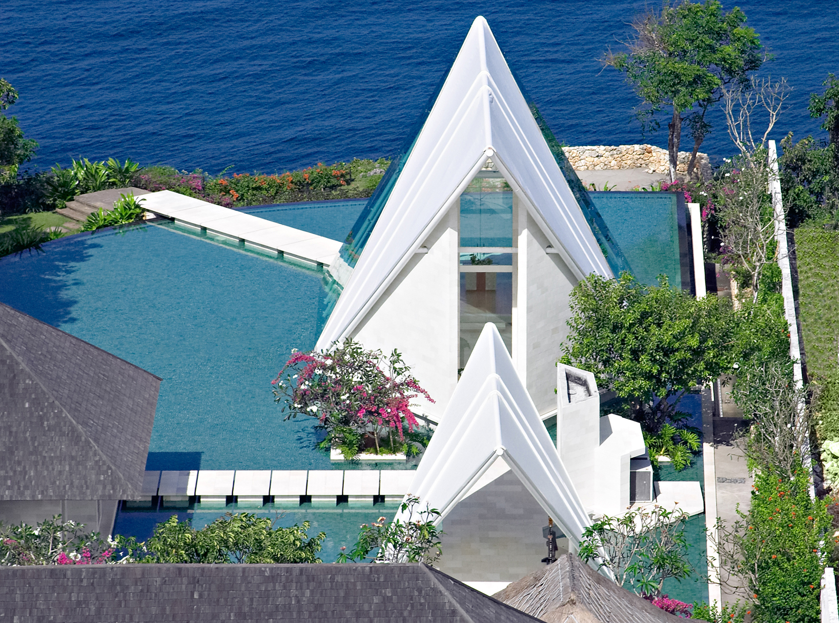 Tirtha Uluwatu Tirtha Uluwatu, set on the Southern cliff top of Bali with sweeping views of the Indian Ocean, designed to host weddings that provide a sense of magic.
